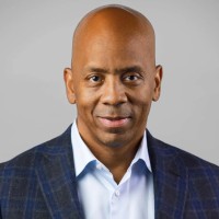 Gary Graves, cofounder of DealerCX, in a professional headshot wearing a navy suit jacket and light blue dress shirt.